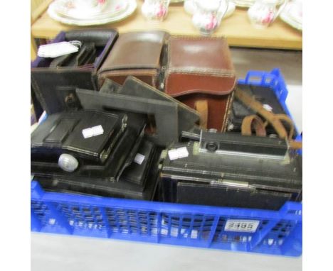 A quantity of Ziess Ikon camera items including 'Ideal Tessar Lens', roll film backs, slides etc.,