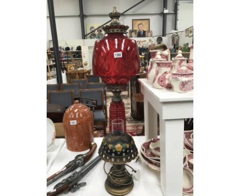 A ruby glass/brass table lamp &amp; 1 other