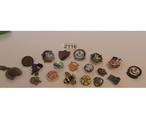 A mixed lot of enamel badges.