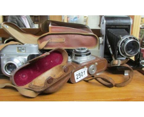 An Ensign camera, a 355 Toyoca camera, a Beirette model II camera and an Ilford sportsman camera, all untested.