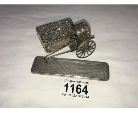 A silver comb case, matchbox holder &amp; a silver Chinese rickshaw