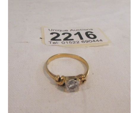 An 18ct gold ring set diamond, size R.