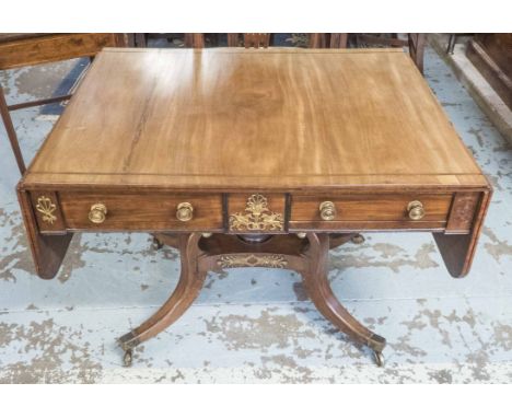 SOFA TABLE, Regency mahogany with inlaid detail, two opposing real and dummy drawers with gilt metal mounts on central carved