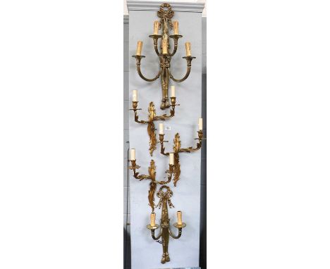 A Set of Three Gilt Metal Twin Light Wall Sconces, of neo roccoco form, 38cm high, together with a five light gilt metal wall