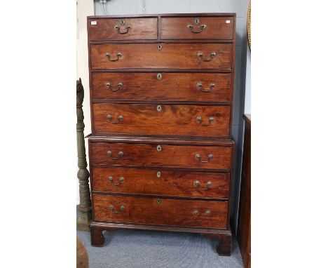 A George III Mahogany Chest on Chest, caddy top over two short and six long drawers, swan neck handles, bracket supports, 107