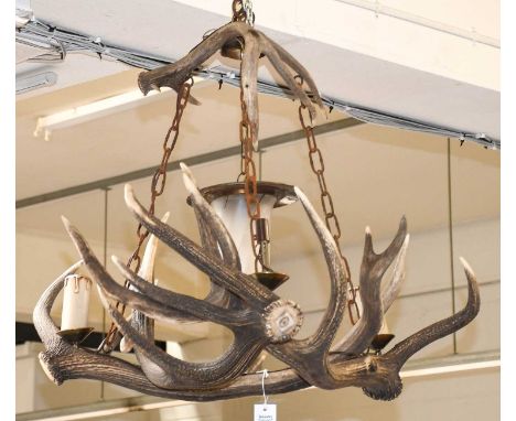 Antler Furniture: Antler Mounted Chandelier, late 20th century, an antler mounted four-light chandelier, formed with three ca