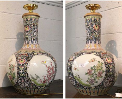 A Large Pair of Chinese Porcelain Bottle Vases, modern, mounted as table lamps, painted in famille rose enamels, Yongzheng se