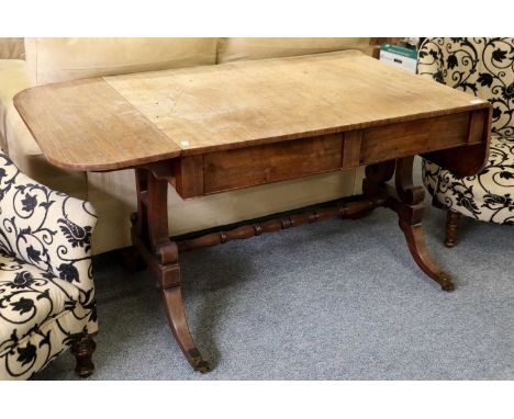 A Regency Mahogany Sofa Table, with two frieze drawers, scroll supports and ring turned cross stretcher, 156cm (open) by 71cm