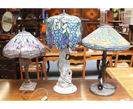 A White Glazed Plaster Lamp Base of Chinoiserie Design, and two further modern lamp bases each with a Tiffany style shade, ta