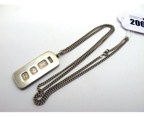 A Hallmarked Silver Ingot Pendant, London 1976 (22grams), on a chain. 