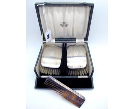 A Pair of Hallmarked Silver Backed Brushes, Charles S. Green &amp; Co, Birmingham 1931, together with matched comb, in  fitte