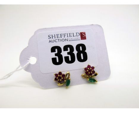 A Pair of Ruby and Emerald Dainty Flowerhead Cluster Earstuds, stamped "375". [2035439]