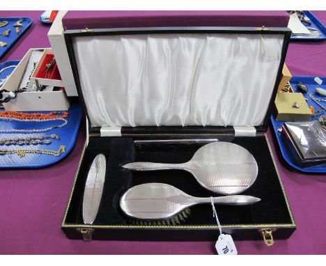 A Hallmarked Silver Backed Four Piece Dressing Table Set, B&amp;Co, Birmingham 1967, comprising two brush, comb and hand mirr