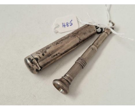 A silver cigar piercer and and case