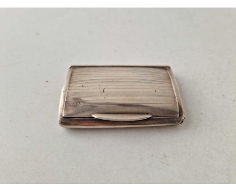 A combined snuff box/ vesta case of curved outline, 2.5 inches wide, Birmingham 1909