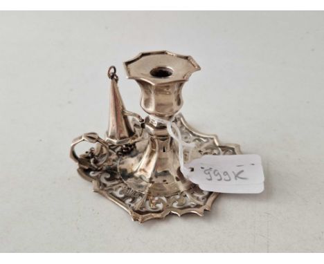 A Chamber candlestick with pierced border and extinguisher, 3 inches wide, unmarked, 65 g.