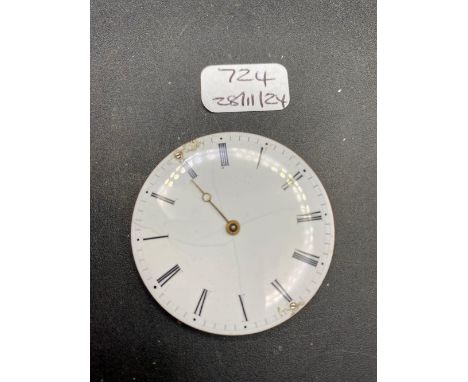 A quarter repeater pocket watch movement with white enamel face