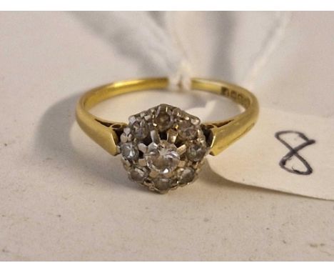 A good diamond cluster ring 18ct gold size L 2.2 gms