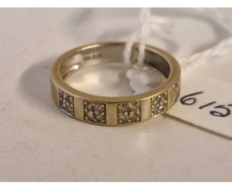 A band ring with cluster of diamonds 18ct gold size N 3.3 gms