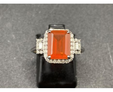 Fine Edwardian Diamond and fire Opal ring set with baguette and round Diamonds Size O 9ct