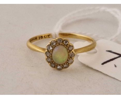 A diamond and opal cluster 18ct gold size N 1.6 gms
