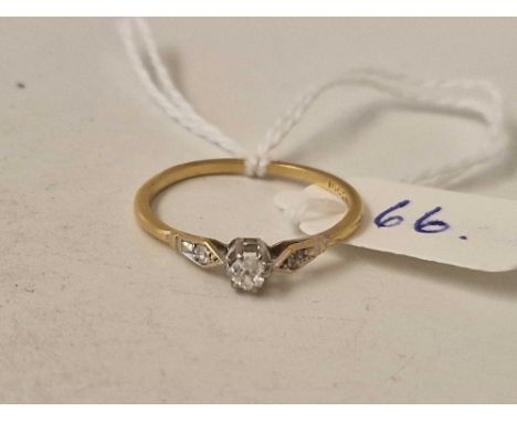A single stone diamond ring with diamond shoulders 18ct gold size R 1.7 gms