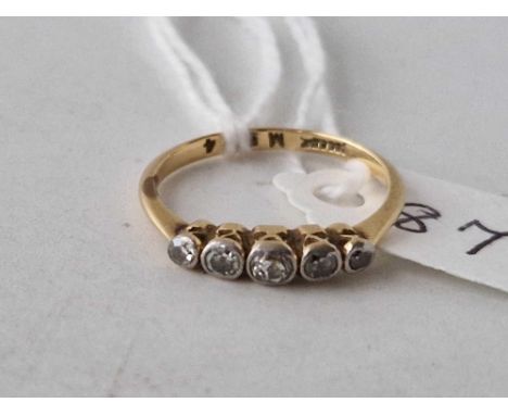 A five stone diamond ring 18ct gold size M 2 gms
