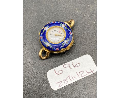 A ladies enamel decorated wrist watch broken hinged 14ct gold