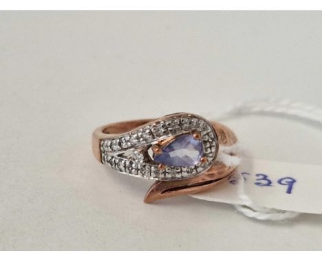 A rose gold tanzanite and diamond snake ring 9ct size N 3.8 gms