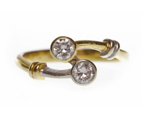 EIGHTEEN CARAT GOLD DIAMOND TWO STONE RINGwith two collet set round brilliant cut diamonds totalling approximately 0.34 carat