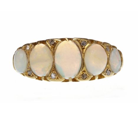 VICTORIAN EIGHTEEN CARAT GOLD OPAL AND DIAMOND RINGthe boat shaped bezel set with graduated oval opals interspaced by rose cu