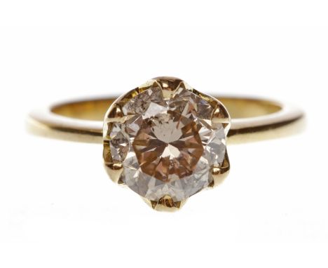 EIGHTEEN CARAT GOLD DIAMOND SOLITAIRE RINGwith a six claw set round brilliant cut diamond with cognac tones of approximately 