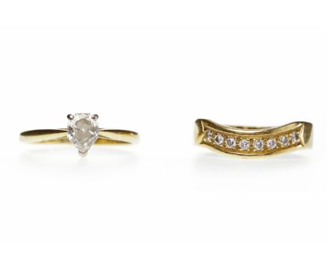 EIGHTEEN CARAT GOLD DIAMOND SOLITAIRE RINGset with a pear shaped diamond of approximately 0.39 carats; along with a diamond s