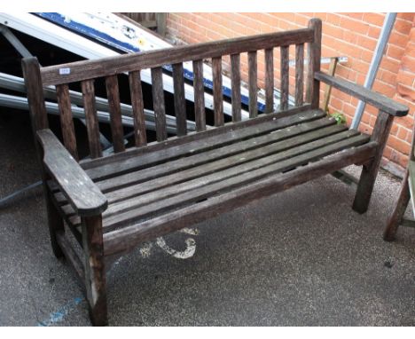 A teak garden bench