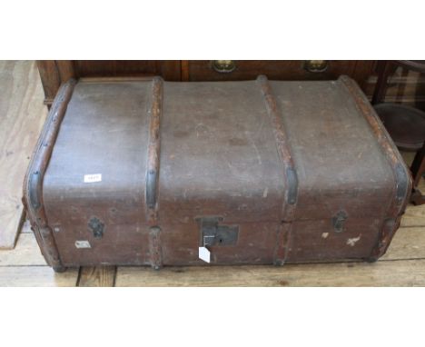 A large canvas steamer trunk