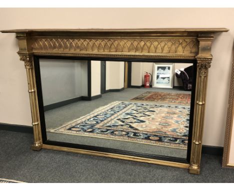 An Empire style gilded pillar mirror 166 cm x 109 cm