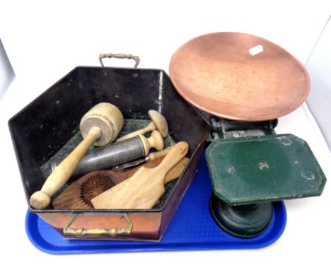 A hexagonal copper twin handled pot containing vintage kitchen tools, set of scales with weights 