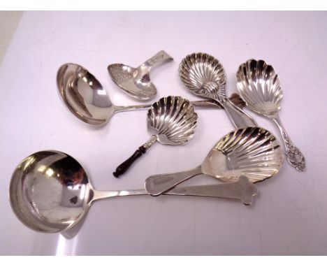 Five assorted caddy spoons including five silver examples. 