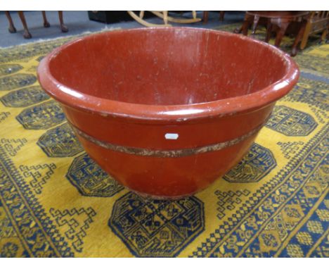 A bamboo lacquered planter.