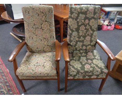 Two beech framed Parker Knoll armchairs in floral tapestry fabric 