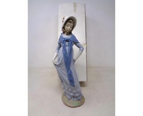 A Nao figure - Lady in Victorian dress, boxed.