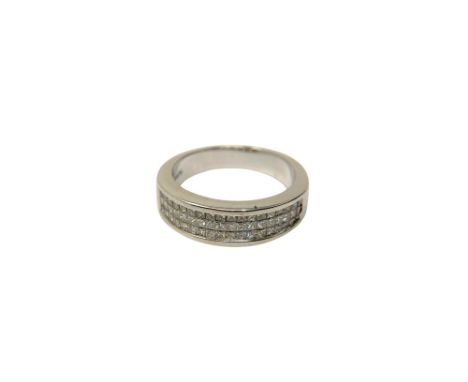 An 18ct white gold ring set with 54 princess cut diamonds CONDITION REPORT: Lot 147 Is a size L.The shank is stamped showing 