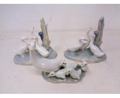 Three Spanish figure groups, Geese and Goslings by Nao and Lladro.