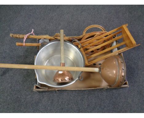 A box of two wicker carpet beaters, wooden trough, aluminium jam pan, two vintage copper headed poss sticks