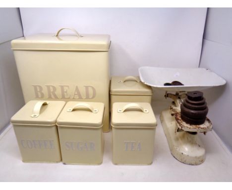 A set of vintage kitchen scales with weights together with a contemporary five piece kitchen bread bin and canister set 