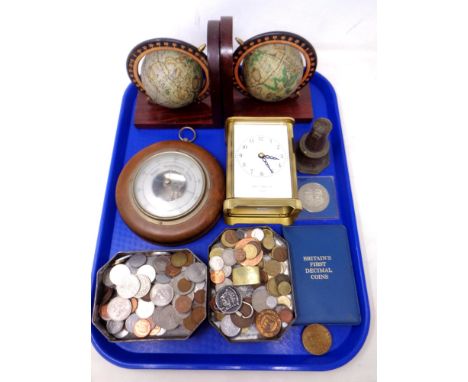 A tray of battery operated carriage clock, assorted coins, decimal coins, barometer, bookends etc 