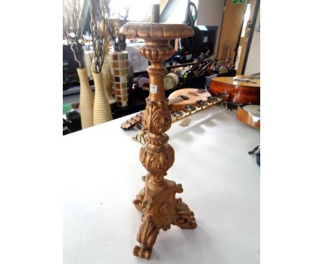 A gilt plaster lamp base