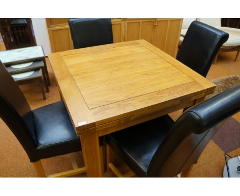 Solid oak dining table and 4 chairs (very good quality)