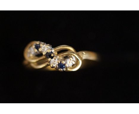 9ct Gold ring set with sapphires &amp; clear stones Size M