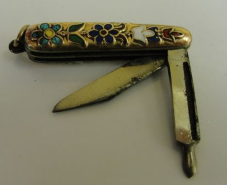 A gold and enamel set miniature penknife with two blades one knife the other a file, double sided floral enamels